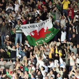 Swansea City Supporters (Jacks) with a flag